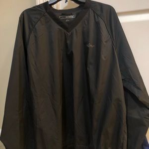 Greg Norman golf windbreaker.